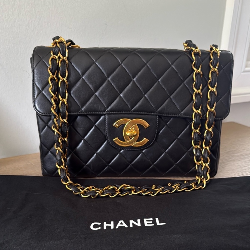 Vintage Black Jumbo Chanel Classic Flap Lambskin with 24K Gold Hardware